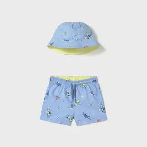 Sett med badeshorts og solhatt blå